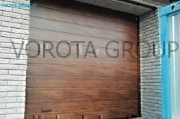 Автоматические гаражные ворота под дерево